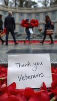 People honor veterans with flowers and appreciation at a memorial site during an observance event photo