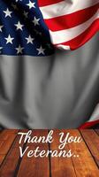 Flags unite to honor veterans with a heartfelt message of gratitude on a wooden surface photo