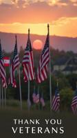 Flags wave proudly at sunset in honor of veterans on a commemorative day of remembrance photo
