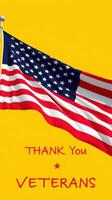 Gratitude expressed through a waving American flag against a bright yellow backdrop honoring veterans photo