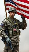 Soldier holding American flag during military event in the United States at dawn with focused determination photo