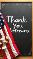 Veterans Day tribute featuring a chalkboard and an American flag in a thoughtful display of gratitude photo