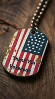 Veteran tribute tag with American flag design showcases gratitude on a rustic wooden background photo