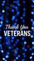 Colorful blue lights create a festive backdrop with a heartfelt message honoring veterans photo