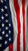 Close-up view of American flag showcasing vibrant colors and distinct patterns of stars and stripes photo