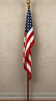 American flag stands proudly on a wooden pole against a neutral background in an indoor setting photo