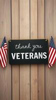 Thank you veterans sign with American flags displayed on wooden background in a tribute setting photo