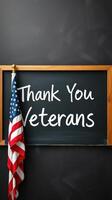 Sign expressing gratitude to veterans displayed alongside an American flag in a classroom setting photo