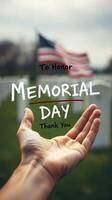 Hand reaching out to honor service members on Memorial Day with American flags in the background photo