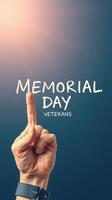 Hand displaying number one gesture with text celebrating Memorial Day for veterans against a blue background photo