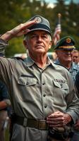 Respectful salute during a military ceremony with veterans and officials in attendance photo