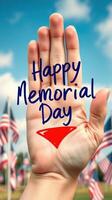 Memorial Day celebration featuring hand gesture and American flags on a sunny day photo