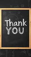 Gratitude expressed on a chalkboard during a casual gathering in a cozy indoor setting photo