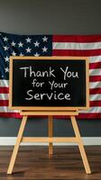 Message of gratitude written on a chalkboard in front of an American flag in a cozy indoor setting photo