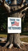 Veterans Day appreciation displayed on a tree in a park with a flag motif promoting honor and gratitude for service members photo