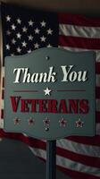 Celebrating veterans with a heartfelt message in front of an American flag at a community event photo