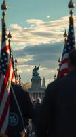 Honor and remembrance at a patriotic gathering with flags waving against a cloudy sky photo