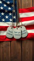 Thanking veterans with dog tags against an American flag backdrop photo