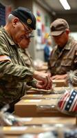Volunteers prepare care packages for troops during community event in a local center photo