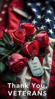 Tribute with red roses placed on an American flag honoring veterans in a heartfelt gesture of gratitude photo