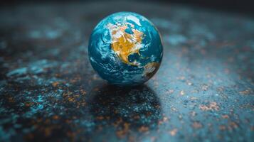 A small blue marble representing Earth photo