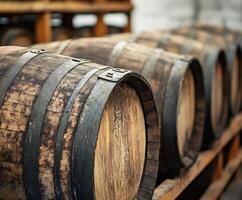 Crafting traditional beverages in a rustic distillery with wooden barrels displayed in rows photo