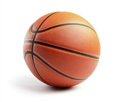 Basketball resting on a surface, showcasing its texture and design in a close-up view of a sports object photo