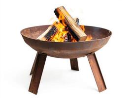 Fire pit with burning logs providing warmth and ambiance in a cozy outdoor setting during a cool evening photo