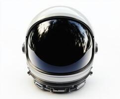 Astronaut helmet displayed against a white background highlighting its sleek design and reflective visor features photo