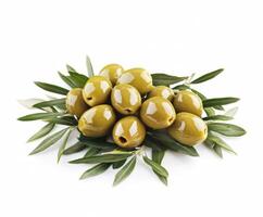 Green olives arranged on a bed of fresh olive leaves with a white background highlighting their glossy texture and natural colors photo