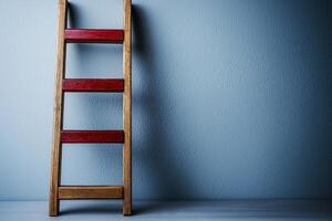 Red ladder against a blue background symbolizes the concept of challenge and chaos in creative thinking and problem-solving approaches photo