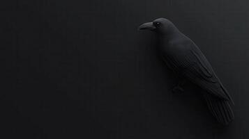 Black raven resting on a dark surface, highlighting its sleek feathers and piercing eyes during low light conditions photo