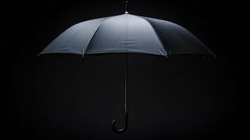 Black umbrella suspended in a dark environment with rain droplets, creating an atmospheric effect photo
