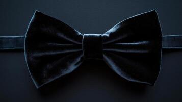 Elegant black velvet bow tie suitable for formal events and celebrations photo