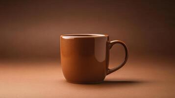 A brown mug on a brown background photo