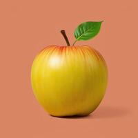 A Single Yellow Apple with Red Streaks and a Green Leaf photo