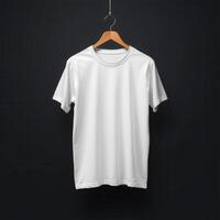 White T-Shirt Hanging on a Wooden Hanger Against a Black Background photo