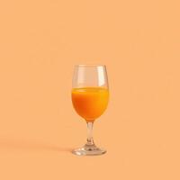Orange Juice in a Clear Wine Glass photo