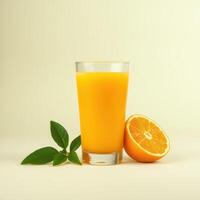 Refreshing Glass of Orange Juice with Fruit and Leaves photo
