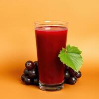 Refreshing Grape Juice with Grapes and Leaf photo