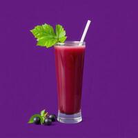Refreshing Glass of Grape Juice with Leaves photo