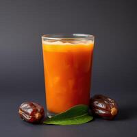 Refreshing Date Juice Drink Glass With Dates photo