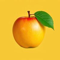 A Single Yellow Apple With A Green Leaf photo