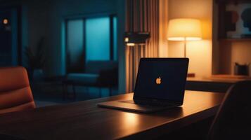 Laptop on a Table in a Dimly Lit Room. photo