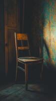 Old Wooden Chair In A Dark Room. photo
