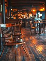 Cozy Cafe Interior with Cup of Coffee on a Wooden Chair. photo