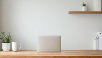 Minimalist Workspace with Laptop, Plants, and Wooden Shelf. photo