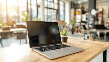 Laptop on a Desk in a Modern Office. photo