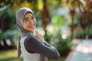 Smiling Woman in a Hijab Background Park photo