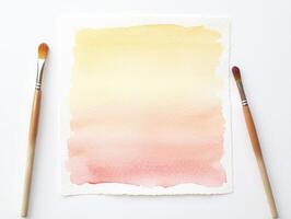 Soft and serene watercolor gradient on paper with brushes for artistic inspiration photo